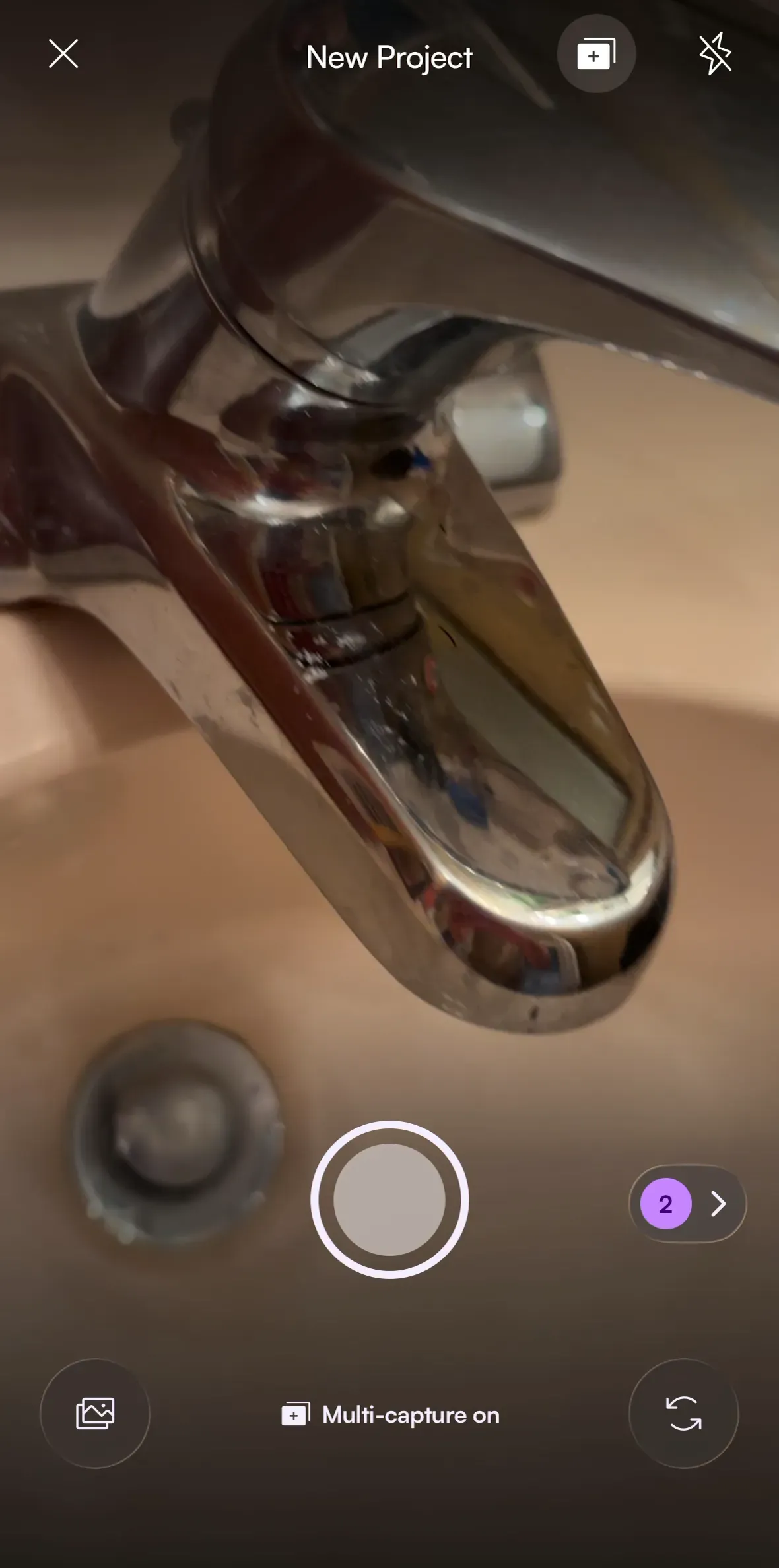 Finderly camera in multi-capture mode with a running count of two photos